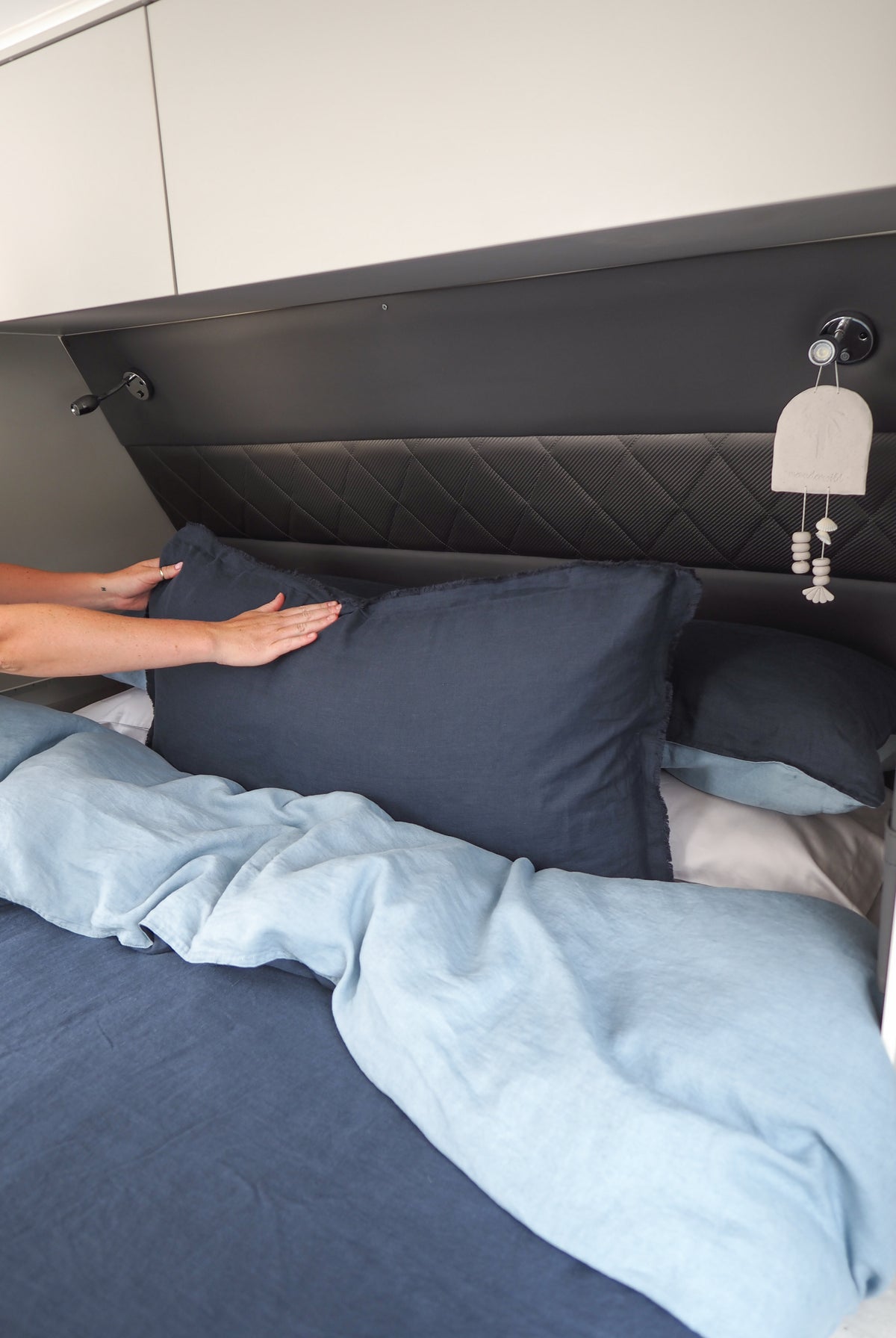 Coast Lifestyle Lumbar Cushion styled on caravan bed