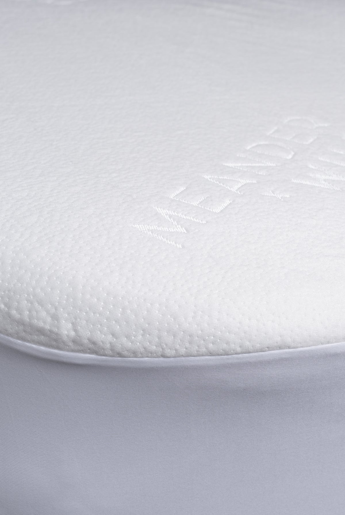 Corner detail of MeanderWild mattress protector fabric