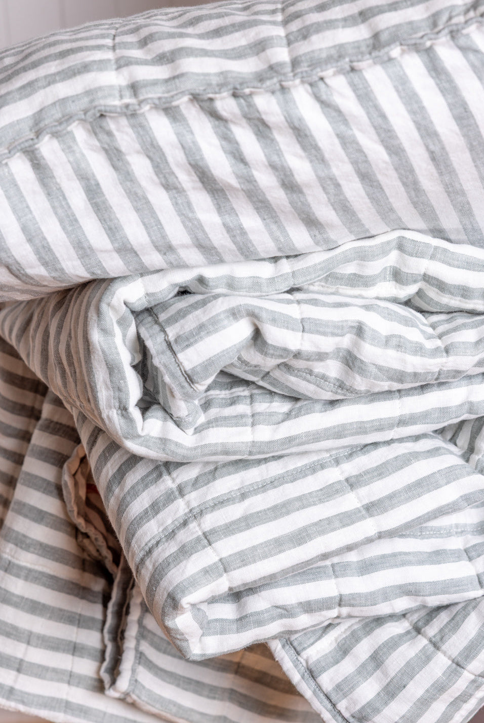 Close up of Coverlet fabric Coolabah colourway