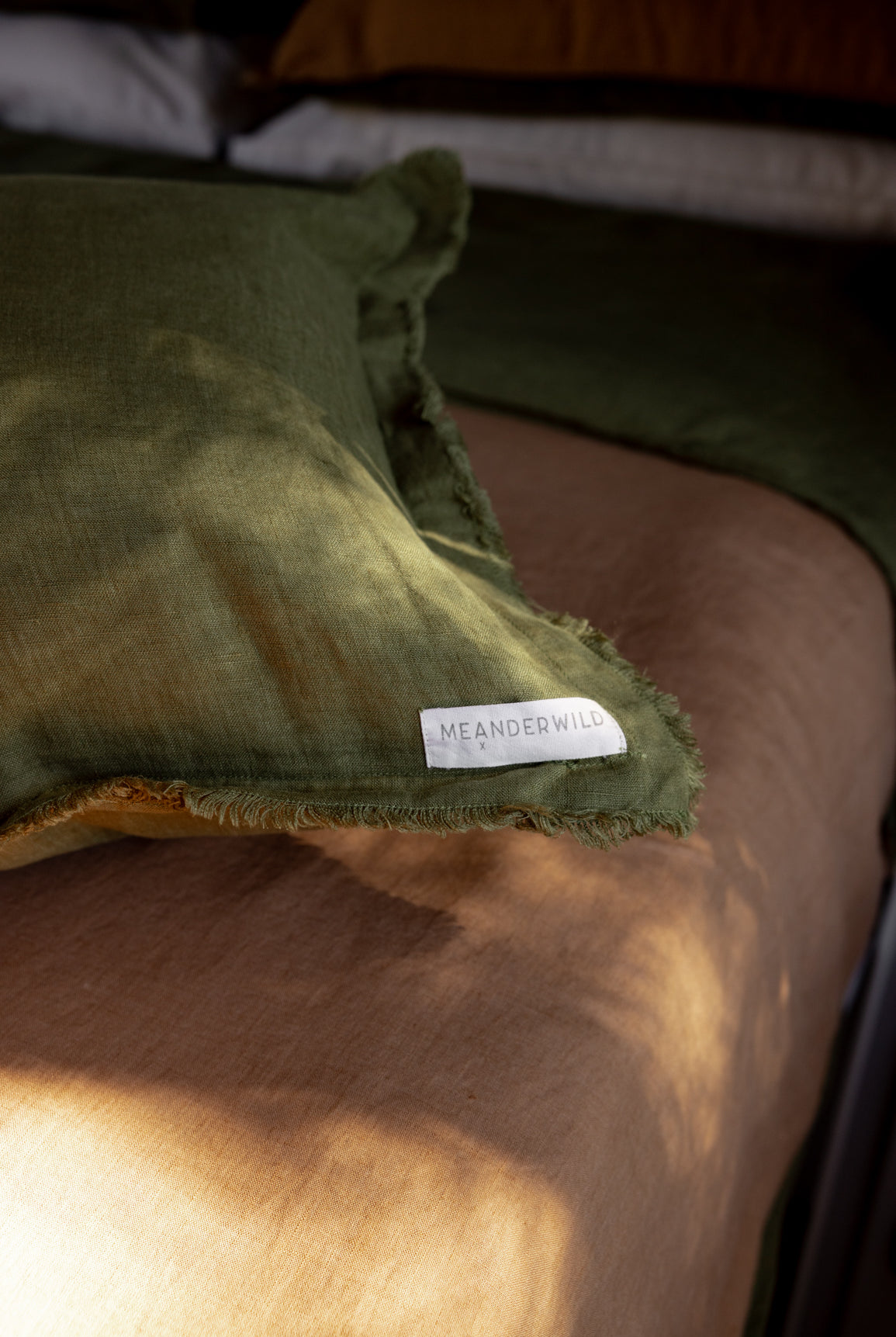 fringed detail on lumbar cushion
