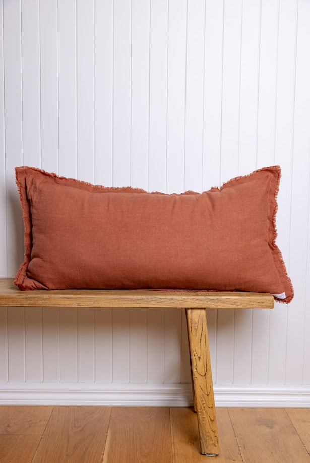 Fringed detail cushion styled on bench colourway outback rose