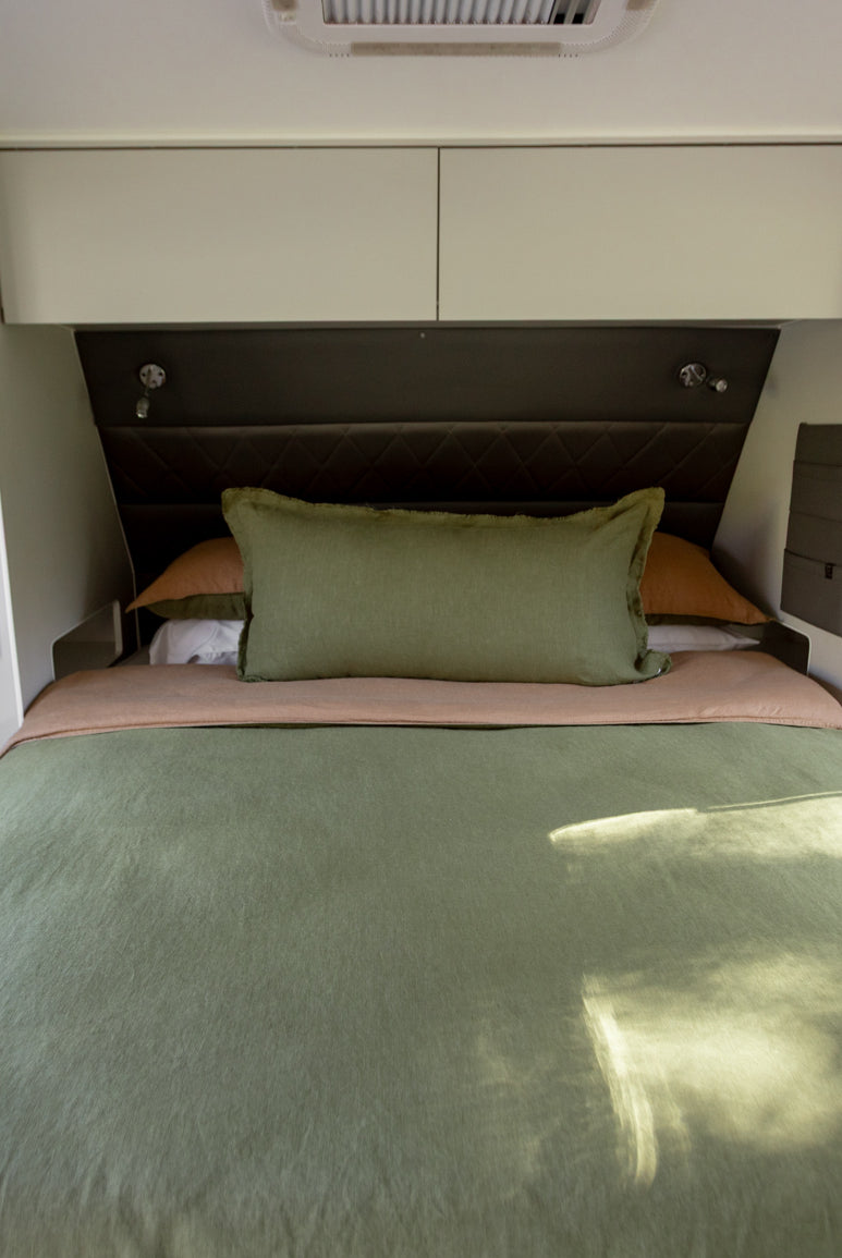 Caravan bed styled in Forest