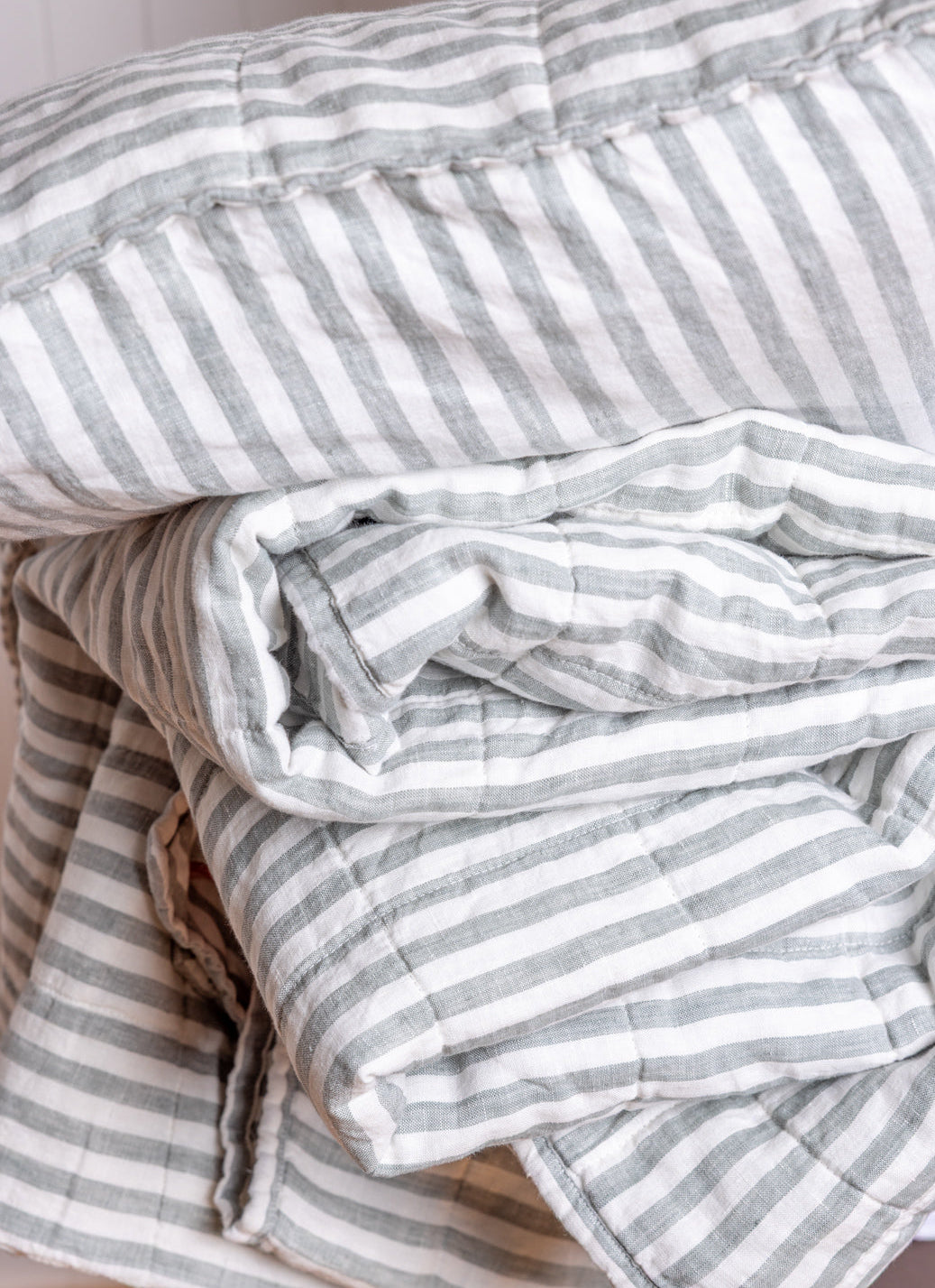 Close up of Coverlet fabric Coolabah colourway