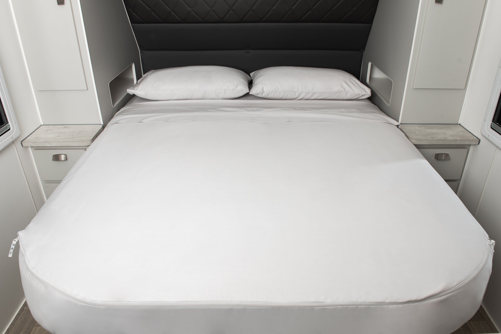 Caravan bed with MeanderWild Driftwood colourway sheet set