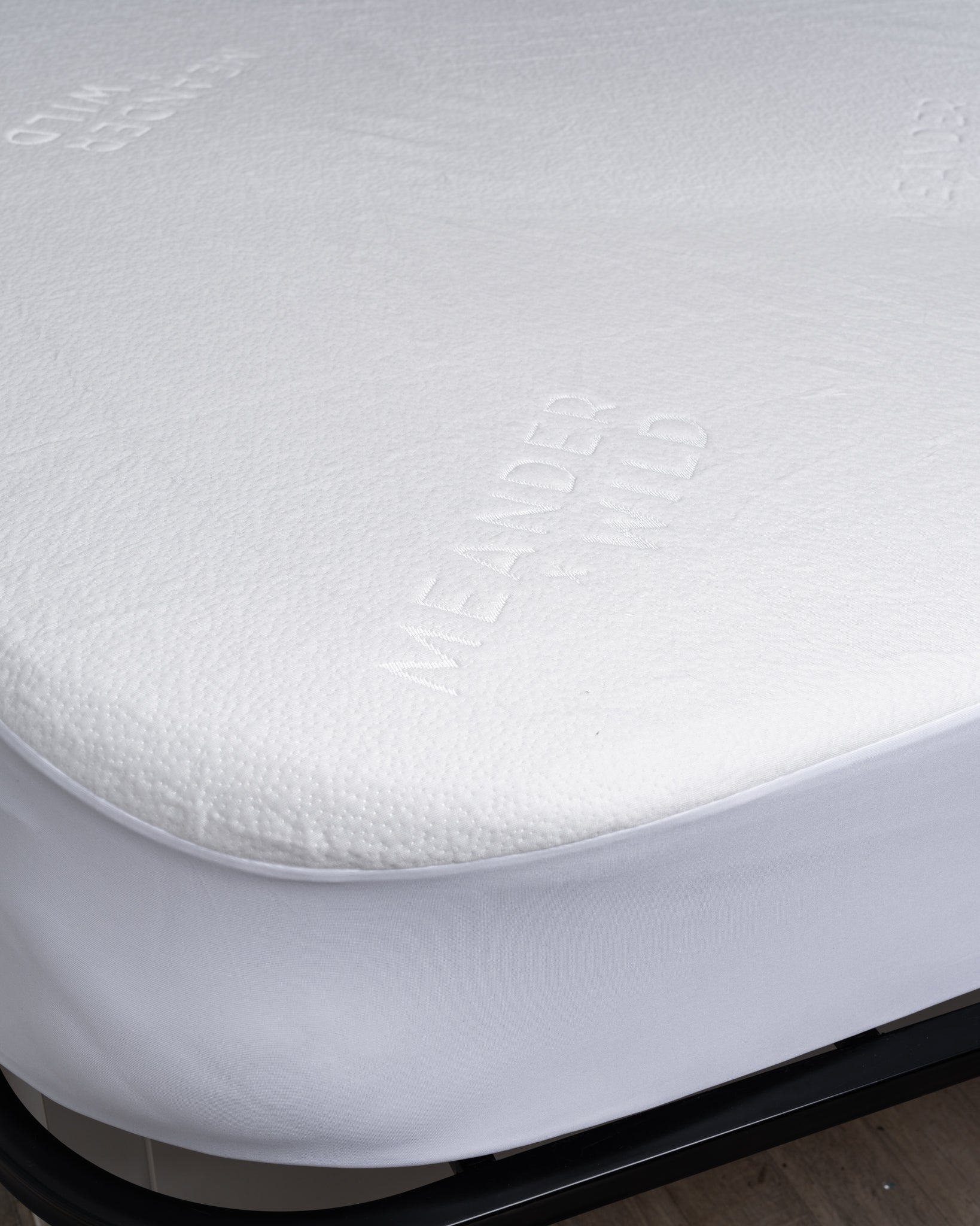 Detail of rounded corner mattress protector