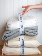 Linen stack wrapped in organisation band