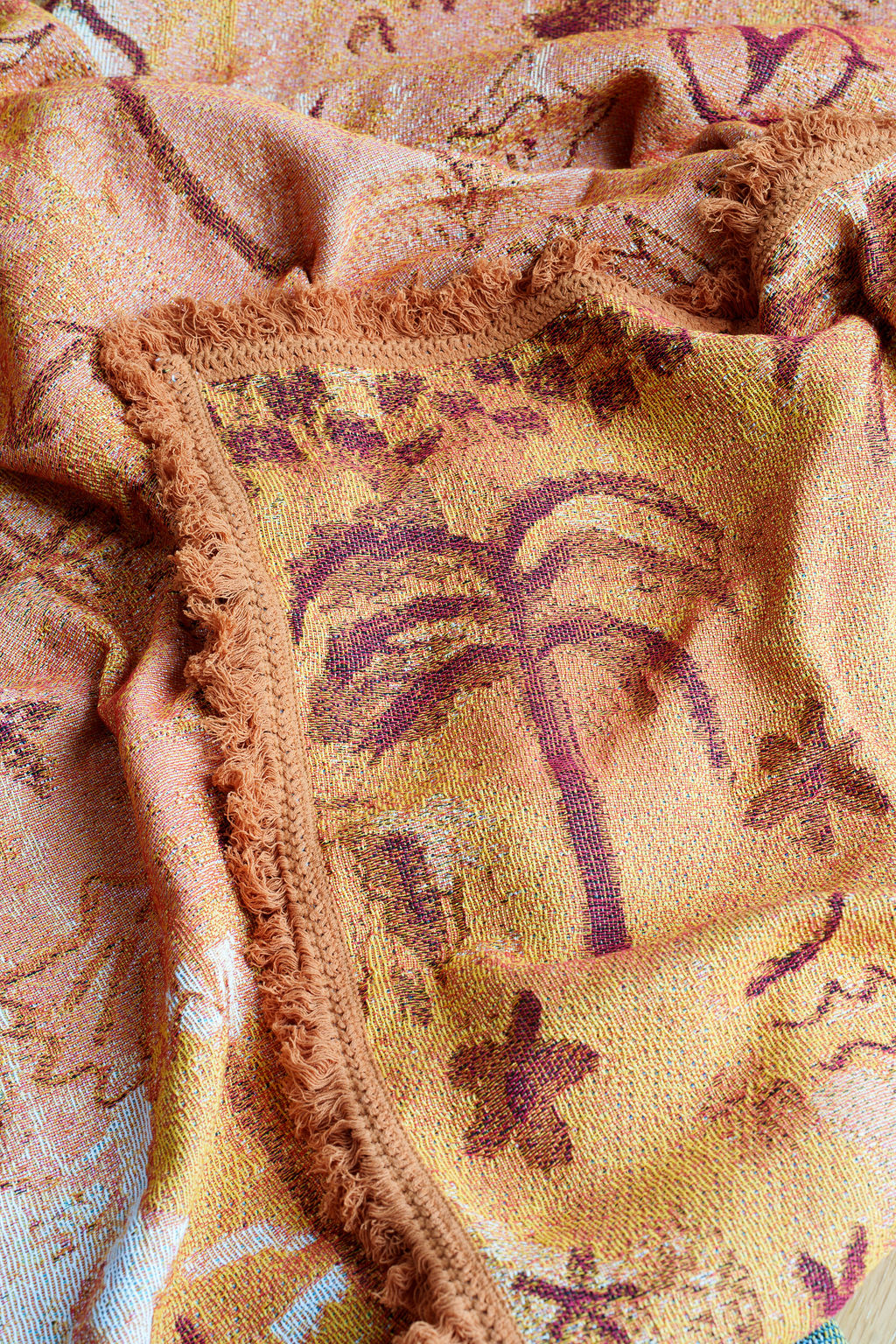 Detail of palm tree on the painted track throw