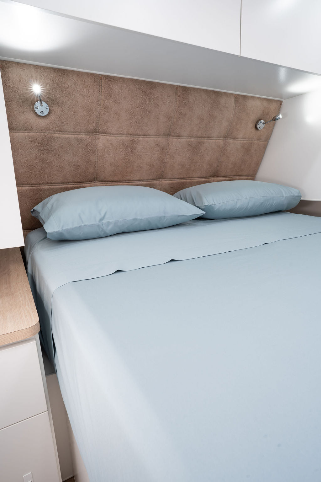 Caravan bed featuring Reef Sheets