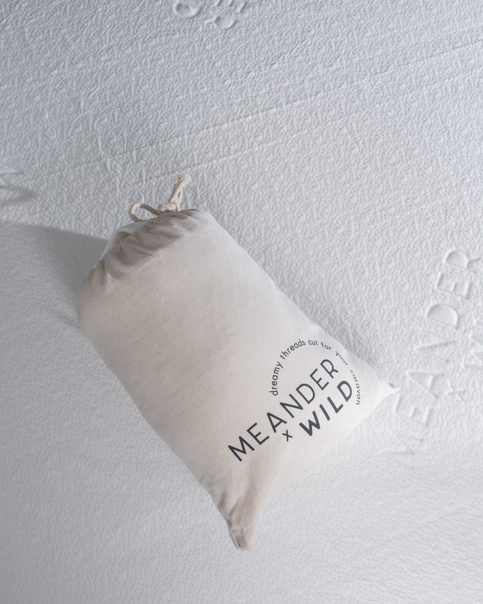 Detail of mattress protector fabric and product bag