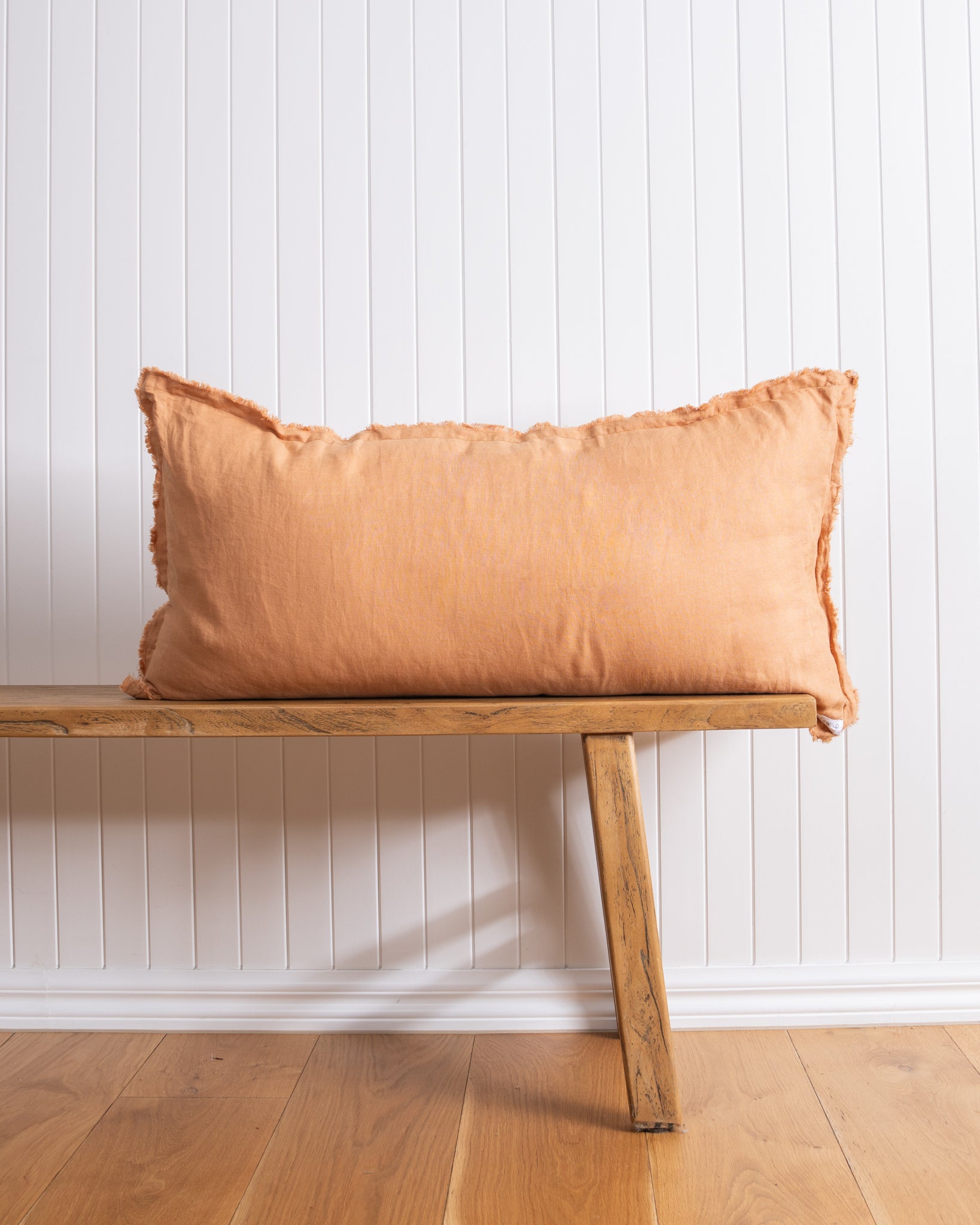 Ochre Lifestyle Lumbar Cushion styled on bench