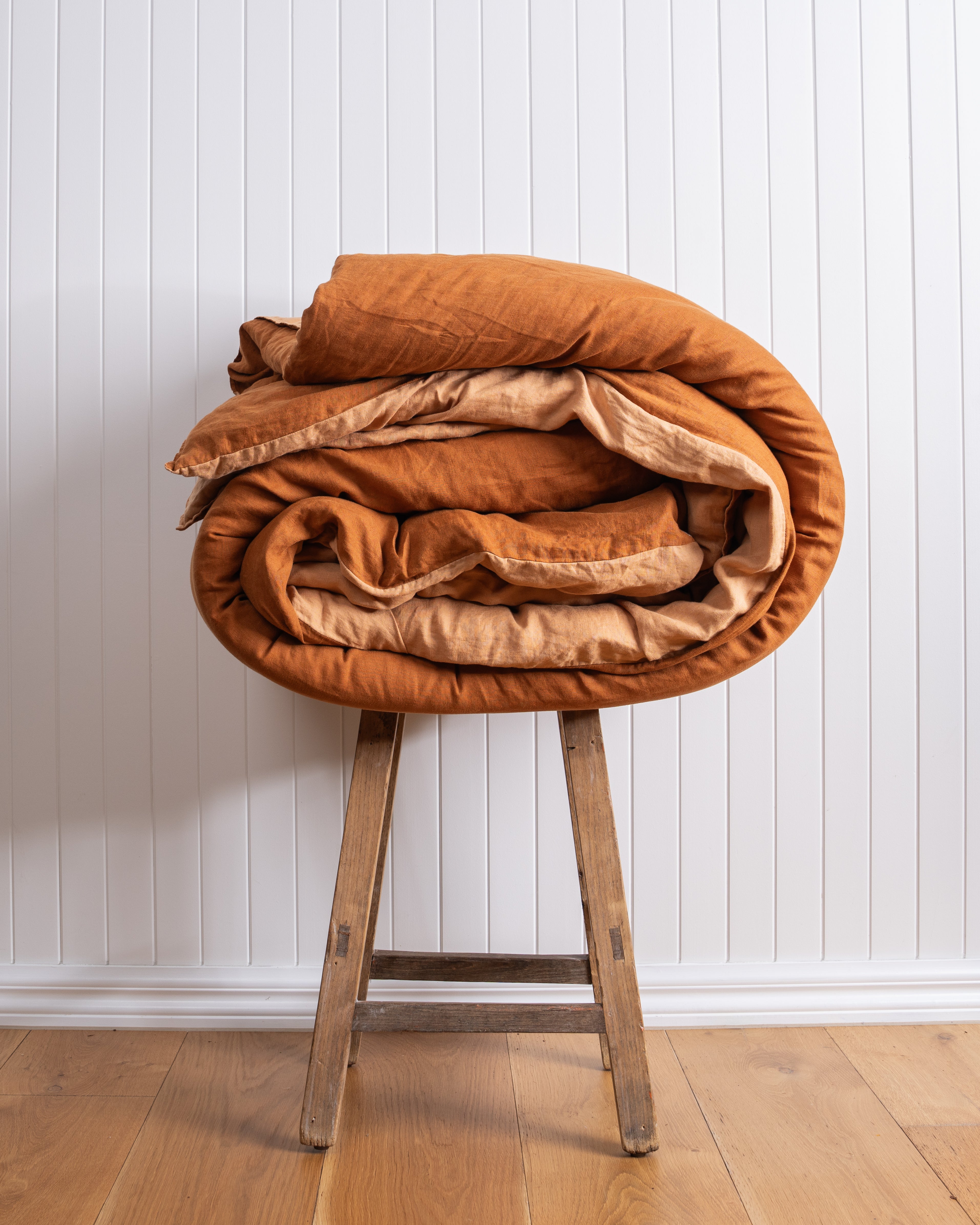 Ochre fabric detail against white wall