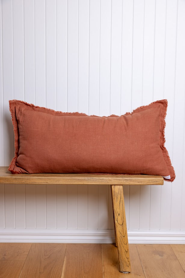 Fringed detail cushion styled on bench colourway outback rose