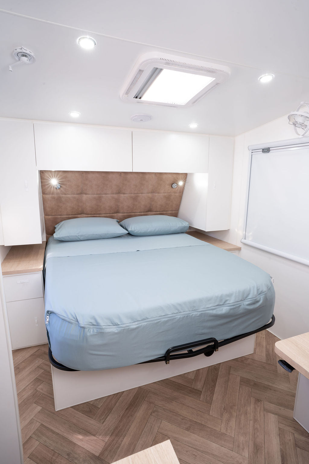 A caravan bed featuring Reef colourway