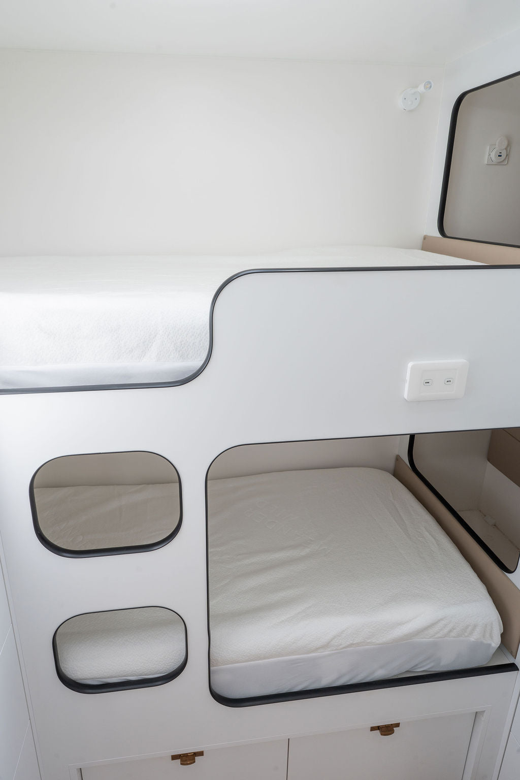 Bunk bed in caravan with MeanderWild Mattress Protector