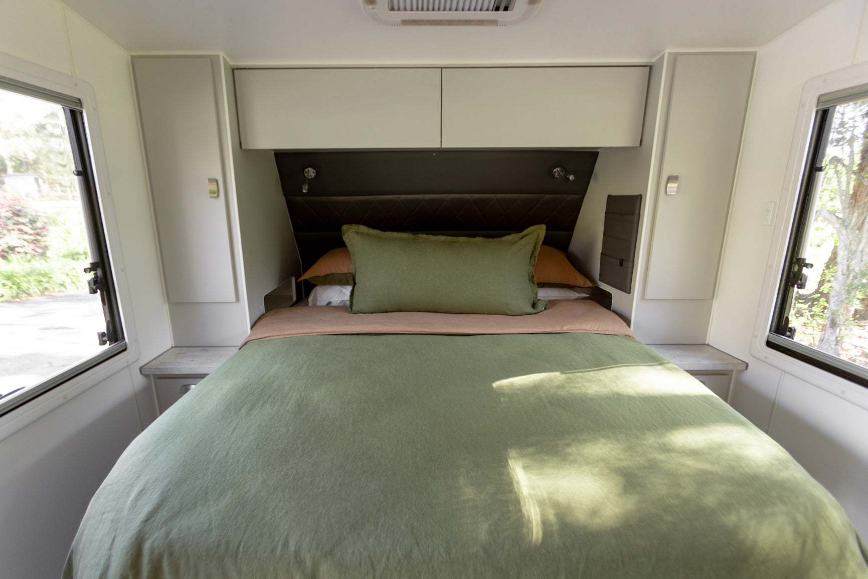 Caravan bed styled in Forest 